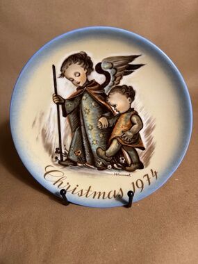 59. 1974 Hummel Christmas Plate – “The Guardian Angel” by Sister Berta Hummel (B